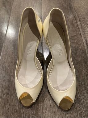 CHANEL Cream Patent Leather Peep-Toe Heels with Gold Toe Caps